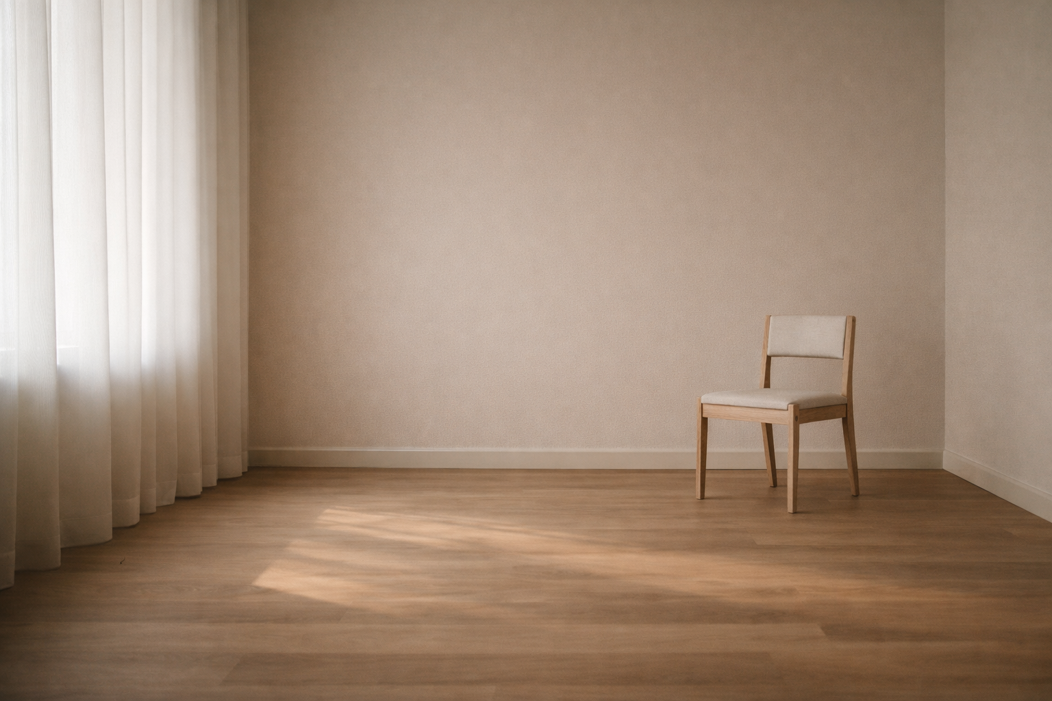 Minimalist interior with a single finished room, clean surfaces, and soft natural light representing letting one room stay finished at home.